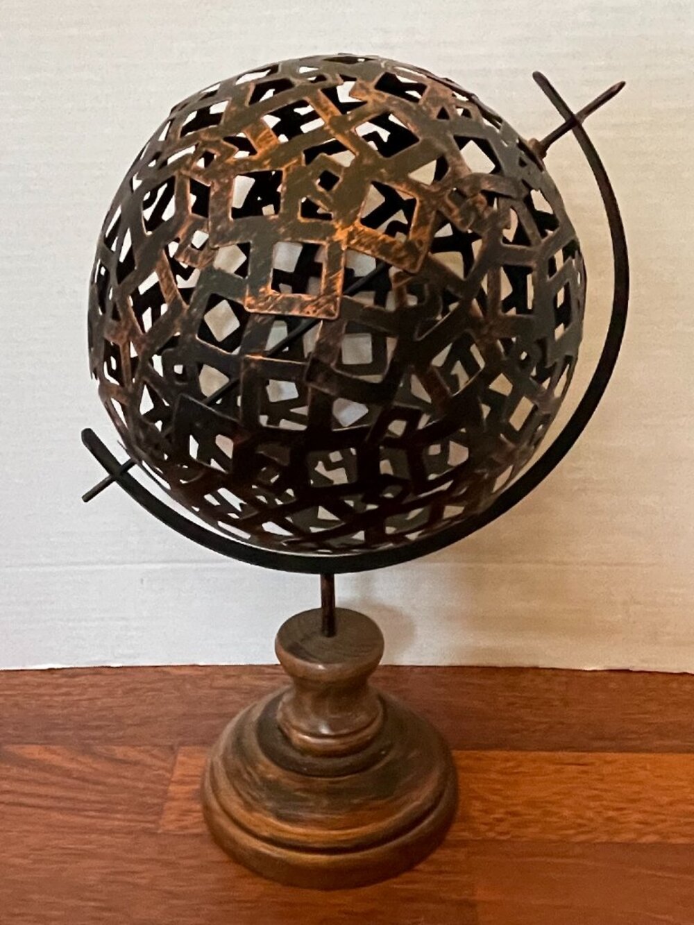 Bronze Metal Spin Orb Sphere 14" on Brown Wooden Base